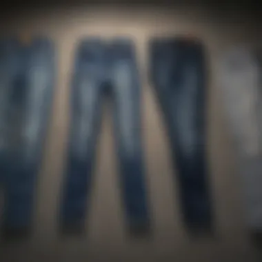 Different fits of jeans laid out flat on a surface