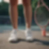 Stylish tennis shoes paired with a summer dress