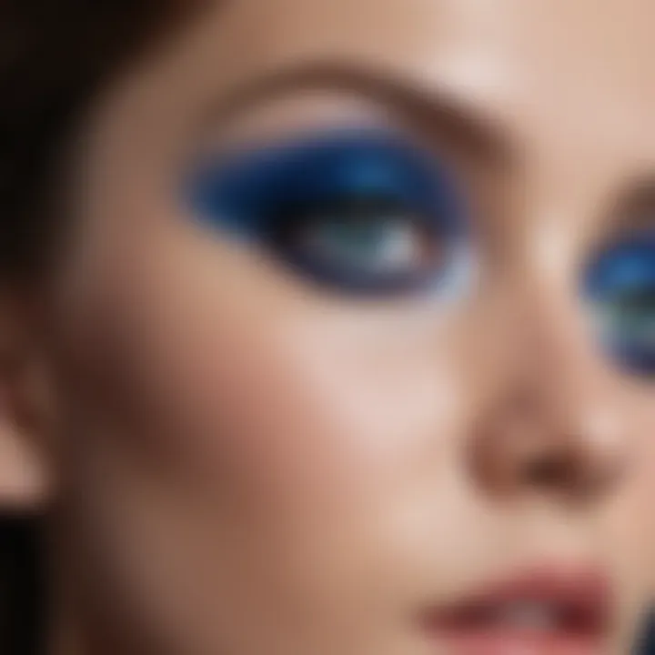 Close-up of a model showcasing bold blue eyeshadow