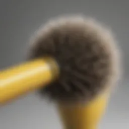 Close-up view of the Drybar Hair Drying Brush highlighting its bristles and heat settings.