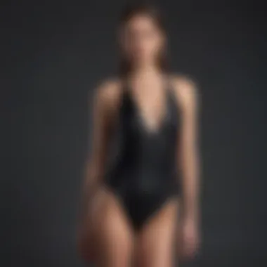 Minimalist one-piece swimsuit in luxurious black silk