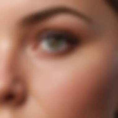 Eyelash Tint Application Process Close-up of a person applying eyelash tint, focusing on the eyes and the tint application.
