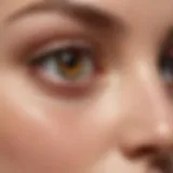 A close-up of luxurious under eye firming serum bottle