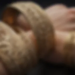 Elegant gold bangles showcasing intricate designs for larger wrists