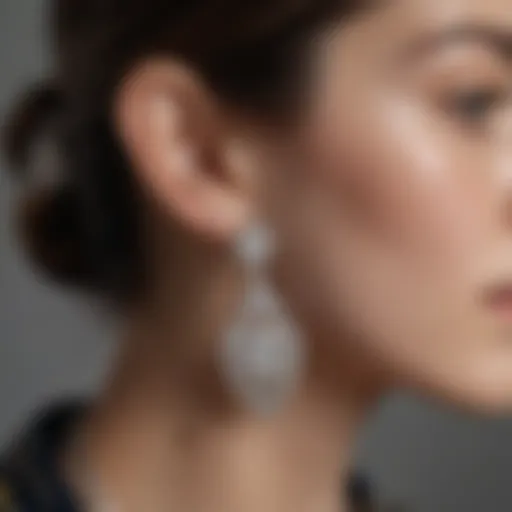 Close-up view of Gucci GG silver earrings showcasing intricate details