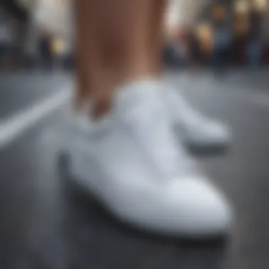 Pair of white sneakers in urban setting