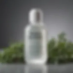 A close-up view of a topical hair treatment bottle surrounded by fresh herbs