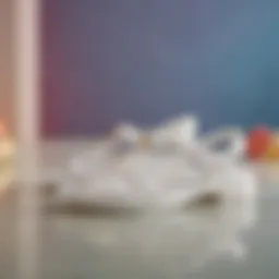 A pair of stylish white jelly sandals on a colorful background