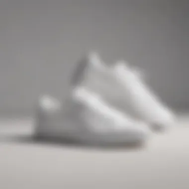 Minimalist Clean All-White Tennis Shoes Clean all-white tennis shoes on a minimalistic background