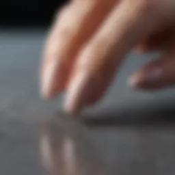 A close-up of subtle neutral nail polish shades.