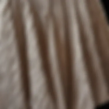 A close-up of intricate pleating on a fabric showcasing texture and design.